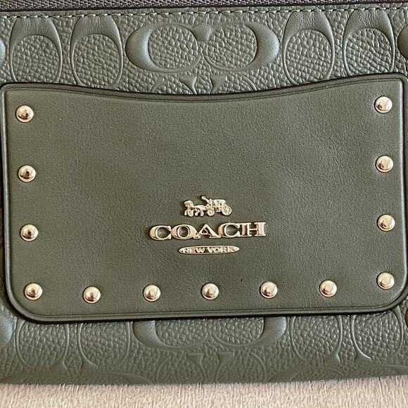 Coach Signature Embossed Leather Wristlet - Picture 2 of 16